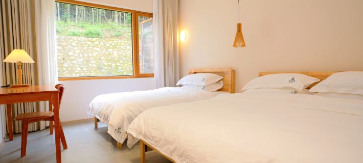 Qiye Forest Homestay Hotel a Liuba