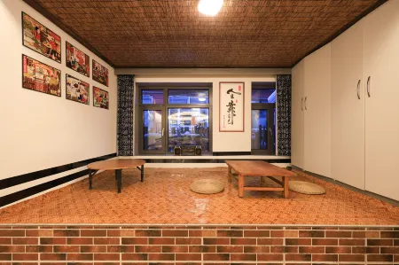 xiaoheimei inn Отели в г. Учан