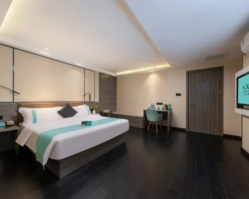 Xana Lite Hotelle (Jiangmen Wuyi University Lihe Plaza） Номера Photos