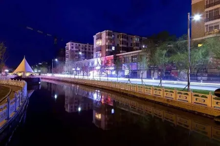 Baoqing Orange Family Homestay Отели в г. Баоцин