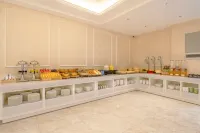ホームイン・ポリシェロンインターナショナルホテル（瑞麗財富広場彩雲城） - 朝食