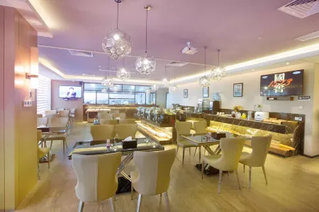 Fortune Modern International Hotel Отели рядом с достопримечательностью «Dongguan Xiangshi Zoo»