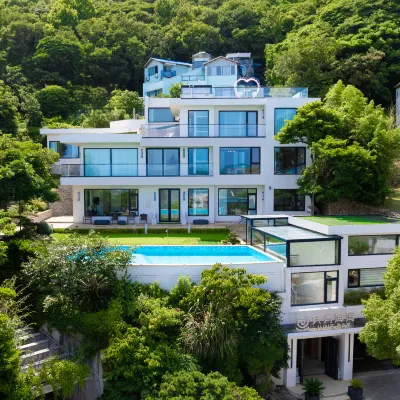 June Bay. sea and sunr i se Golf Pool Seaview Villa (Zhujiajian Nansha Store) โรงแรมใกล้อุทยานแห่งชาติต้าชิงซาน