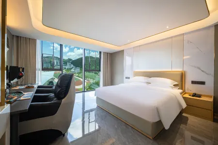 Xianghua Esports Hotel (Qiannan Normal University Wanda Plaza Branch) Отели в г. Дуюн