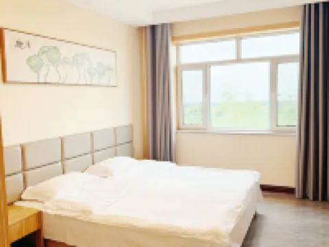 Liangcheng Jinshi Pastoral Homestay (Jinshi Sightseeing Ranch) โรงแรมในเหลียงเฉิง