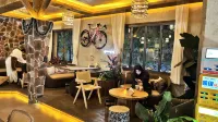 Mangshi Huajianxi Inn (Menghuan Great Golden Pagoda Store) - bar