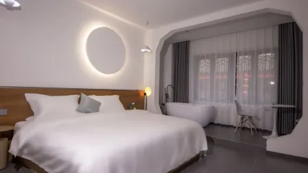 Huaxi Xiyuange Homestay Отели рядом с достопримечательностью «Daxingguo Temple»