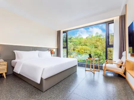 Pusu Xidu Homestay Отели рядом с достопримечательностью «Three Natural Bridges»