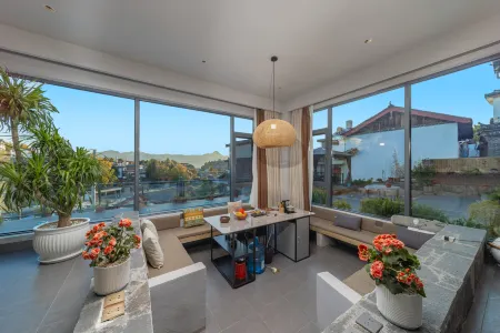 Lijiang Hourglass and Jun View Homestay Отели в г. Лицзян