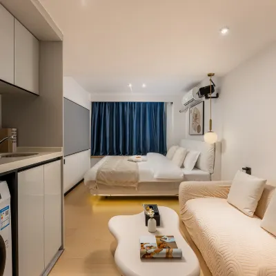 Mingjie Apartment Hotels near ملعب يانزيغانغ