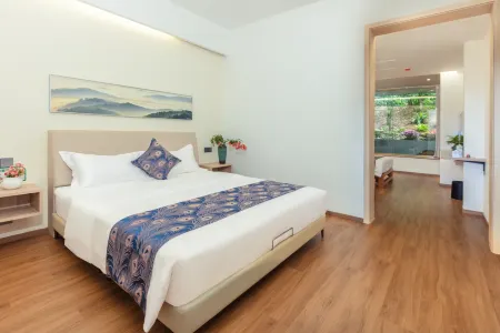 Gurong Chinese Inn (Jingmaishan) Отели рядом с достопримечательностью «The Old Bulang Ethnicity Village of Wenji»