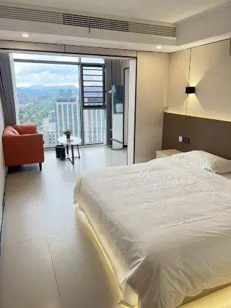 Guangde Lanbowan Apartment (Zhongying International Cinema Shop) Отели в г. Гуанде