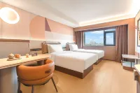 Orange Hotel (Xichang Qionghai 17du Huoba Square) - พร้อมระเบียง
