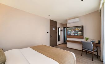 Yuzi Lanting Hotel (Provincial Traditional Chinese Medicine Hospital Qiantang Campus Wenze Road Subway Station)