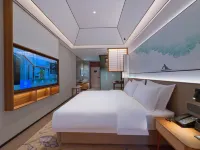 โรงแรมโมฉาง ชิงหย่า (สาขา ว่านผิงโข่ว ศูนย์กลางใหม่เทศบาลริเซา ยื่อจ้าว)