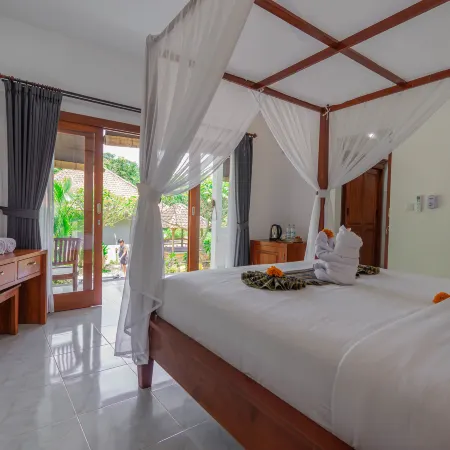 OkaOki Homestay By Bali Cabin Отели рядом с достопримечательностью «Пляж Амед»