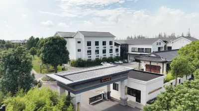 완즈·싼산수이징 농장 호텔 상하이 청지안 직업대학-펑시안/봉현 캠퍼스 주변 호텔