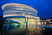 REZEN LONGUU Hotel (Maoming Xinyi Educational City Liuyun Pavilion Sightseeing Tower) - Mountain view