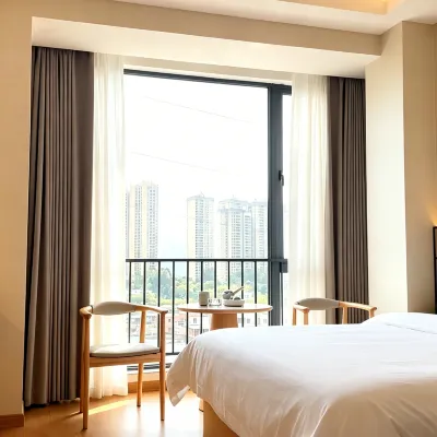 Yunshang Huajian Hotel (Qingyuan Station Country Garden Branch) Hotels near Jian'er Happy World
