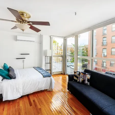 Modern 3BR Townhouse with Private Rooftop & Parking Minutes to NYC