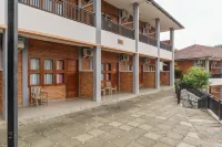 RedDoorz Plus @ Hotel Negeri Baru Lodaya Puncak - Desayuno