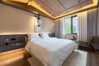 Jingmen Half Tea Beauty Hotel