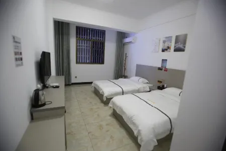 Mengla Heyou Homestay Отели рядом с достопримечательностью «Mohan»