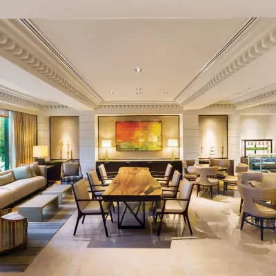 Aruga Apartments by Rockwell Hoteles cerca de Centro comercial Power Plant