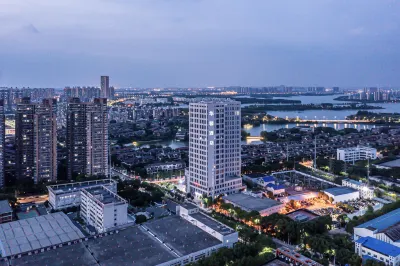 Huaxin Hotel (Wuhan Jinyinhu 5th Ring Sports Center) Hotel in zona Wuhan Dongxihu Administration School (Jing'er Road)