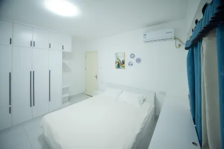 Qinghua Tea Su (Zhanjiang Xuwen Hai'an New Port Branch) Отели в г. Сюйвэнь