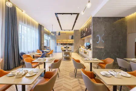 Kyriad Hotel (Dalian Wanda Asheng Shopping Plaza) Отели рядом с достопримечательностью «Dalian Minzu University»