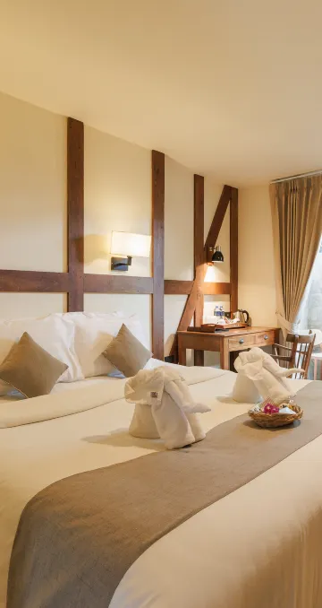 ห้องดีลักซ์ เตียงใหญ่ 1 เตียง