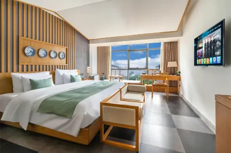 Mohouse Hotel Отели рядом с достопримечательностью «Henan Agricultural University (Longzihu Campus)»