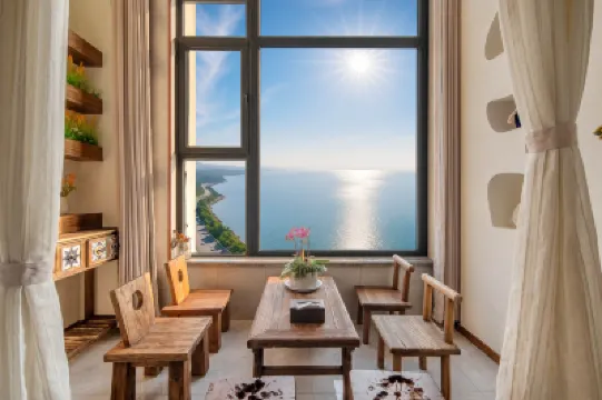 Floral Hotel·Free Travel Beach Hotel (Evergrande Golden Beach Branch) 칭다오 호텔