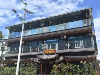 There is a worry-free inn by the sea (Erhai store) Hotel in zona Longshoucheng Relic Site