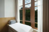 Jiugu Shui Hot Spring Courtyard Hotel a Hezhang