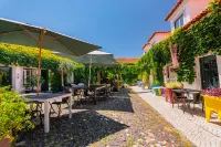 Casa do Patio by Shiadu Отели рядом с достопримечательностью «Байрру-Алту»