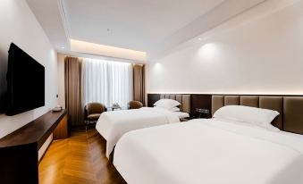 Longchuan Yibao Hotel