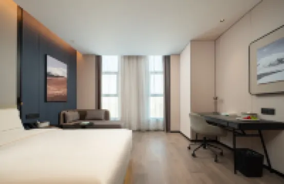 Turpan Guotai Minsheng Plaza Junmin Gongjian Lyuaduo Hotel