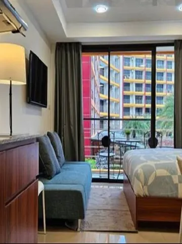 รูปภาพของอพาร์ทเมนต์ Thai Studio Condotel 777 ตั้งอยู่ติดกับชายหาดที่ยาวที่สุดและสะอาดที่สุด
