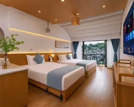 Tianqingshe Riverview Homestay (Phoenix Ancient City Lijiang Branch) โรงแรมในเฟิ่งหวง