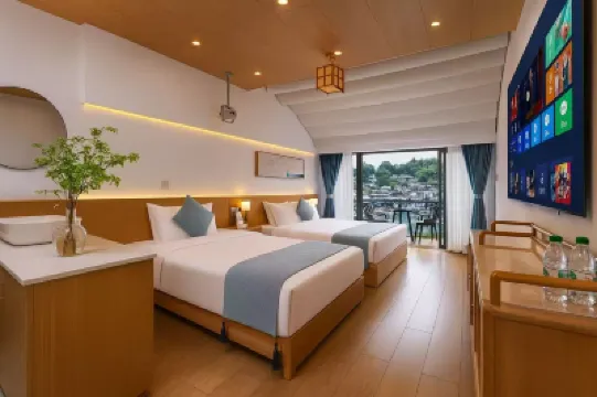 Tianqingshe Riverview Homestay (Phoenix Ancient City Lijiang Branch) Hôtels à : 