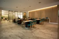 Xingyi Black Mamba E-sports Hotel - فطور