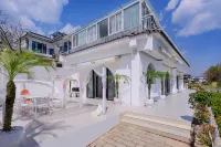 花季·海景設計師民宿(大理洱海生態廊道店) 周保中將軍紀念館附近的飯店