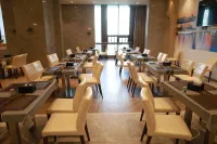 Vienna International Hotel (Xinxing new city square) - Morgenmad