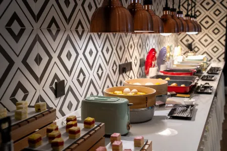 Tianfu Xiguo Hotel Отели рядом с достопримечательностью «Xindu Nibatuo Peninsula»