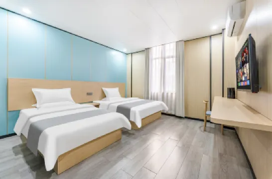 Star Travel Apartment Hotel berhampiran Jinan University Shaw Sports Complex