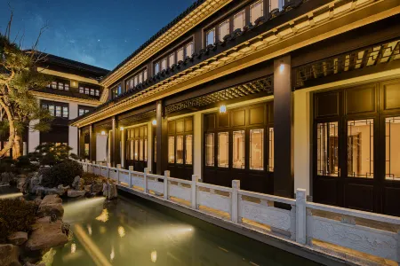 Anji Eryuehua Hot Spring Resort Hotel (Yunshang Grassland Branch) Отели рядом с достопримечательностью «ma jia nong cun»