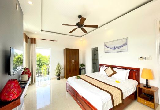 호이안 파미 리트리트 빌라의 모던한 객실 또는 수영장 전경