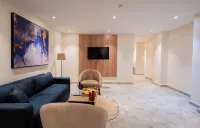 Settle Inn Jebal Apartments - piscina